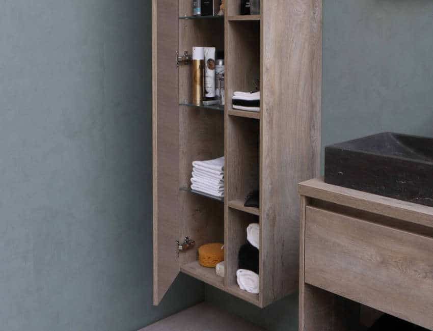 bathroom wall cabinet with toiletries inside