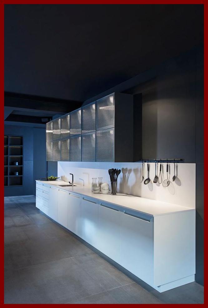White, the Perfect Complementary Color for a Dark Kitchen!