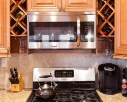 Cinnamon Maple Glazed kitchen cabinet with stove