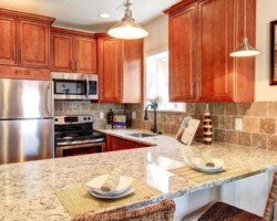 Mocha Maple Glazed countertops with table setting